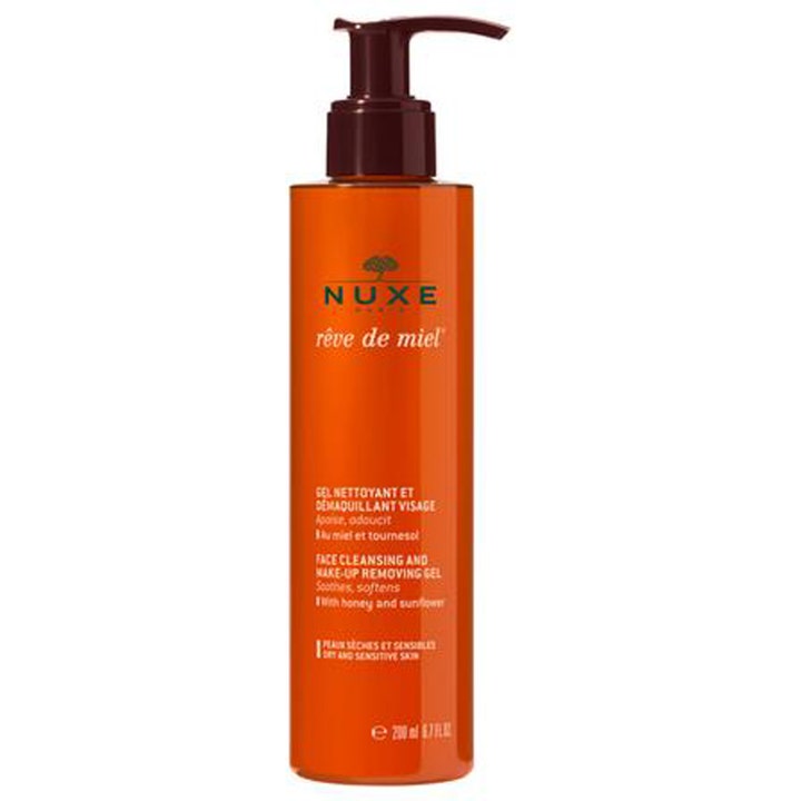 Nuxe Rêve de Miel 200 ml beroligende ansiktsrens med honning i en oransje pumpeflaske med mørkebrunt lokk.