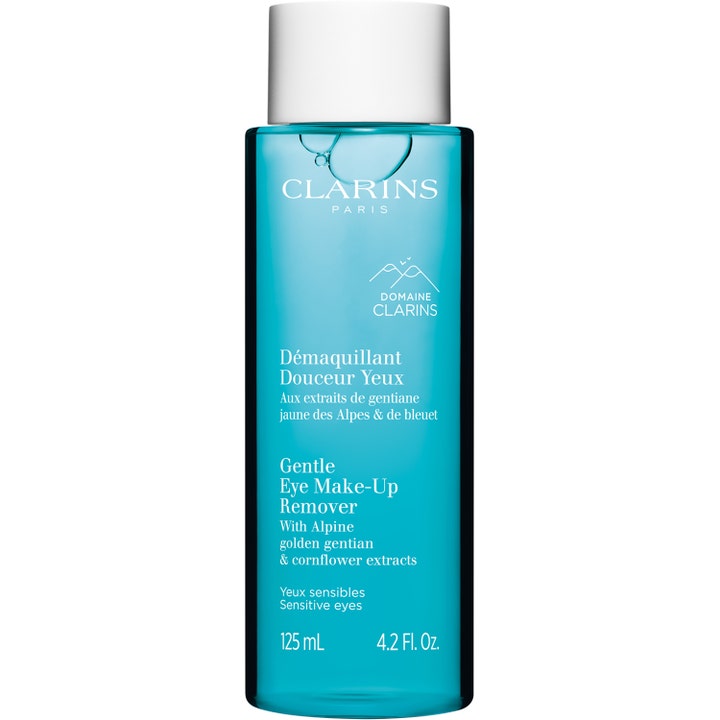 Clarins Gentle Eye Make-Up Remover 125 ml beroligende øyesminkefjerner med blå væske i klar flaske og sølvfarget kork