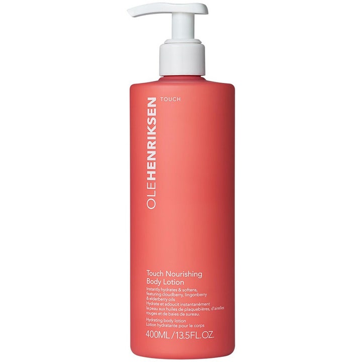 Olehenriksen Touch Nourishing Body Lotion 400 ml fuktighetsgivende kroppskrem i korallrød flaske med hvit pumpe