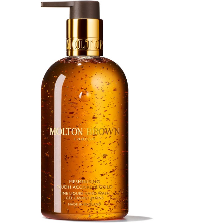 Molton Brown Mesmerising Oudh Accord & Gold 300 ml rensende håndsåpe med glitrende gullflak og elegant gullpumpe