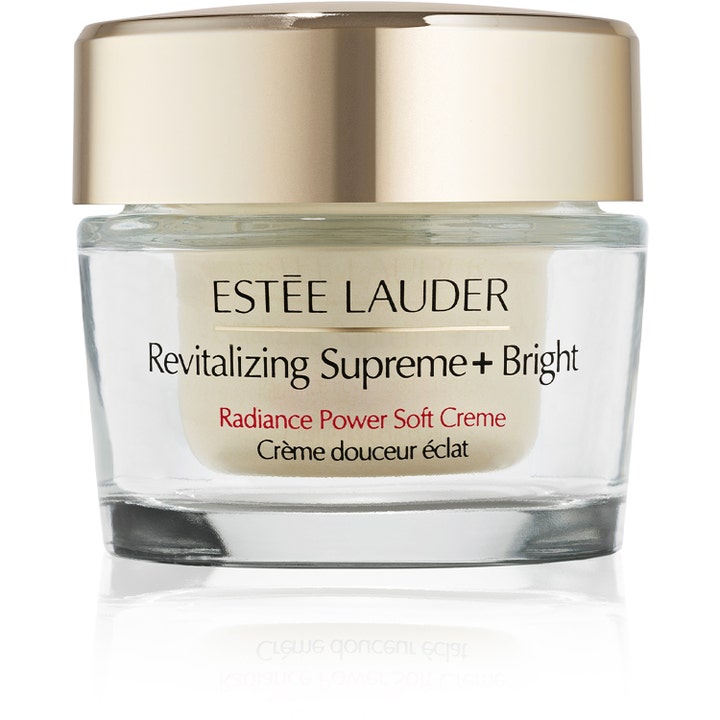Estée Lauder Revitalizing Supreme+ Bright fuktighetskrem som gir glød i en luksuriøs glasskrukke med gullfarget lokk.