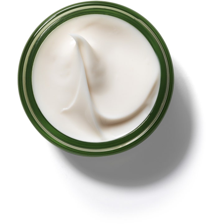 Origins A Perfect World Antioxidant Moisturizer White Tea 50 ml dagkrem i grønn krukke med en myk hvit kremtekstur.