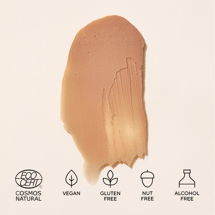 MÁDARA Mineral SPF50 Sunscreen Stick 12 g solkrem for ansiktet har en nude kremet tekstur og ikoner for Vegan og Gluten Free.