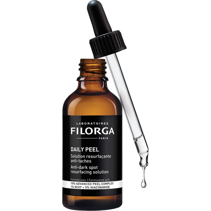 Filorga Daily Peel 50 ml mot mørke flekker i brun glassflaske med pipette og 5 % niacinamid.