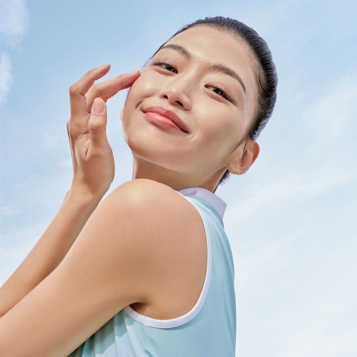 Purito Daily Soft Touch Sunscreen 60 ml solkrem for ansiktet med SPF 50 i hvit tube og oransje og grønn eske