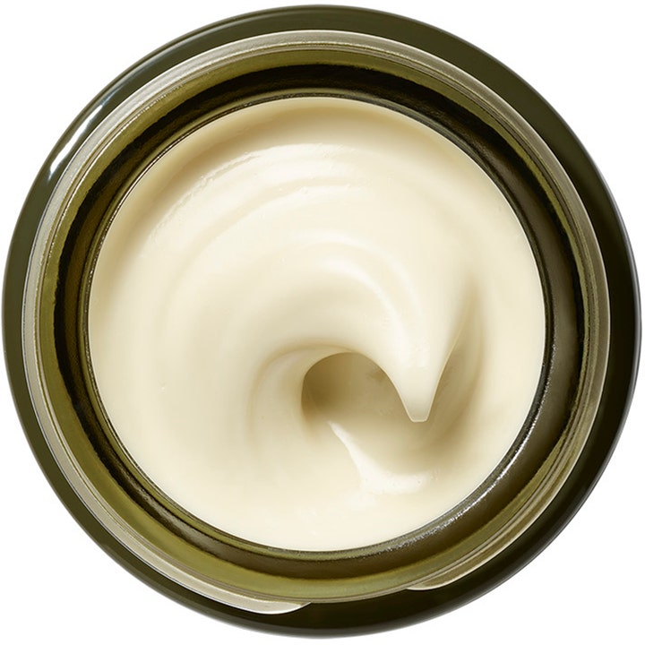 Origins Plantscription Wrinkle Correction Eye Cream 15 ml øyekrem med retinol har en fyldig kremet tekstur i en grønn krukke.