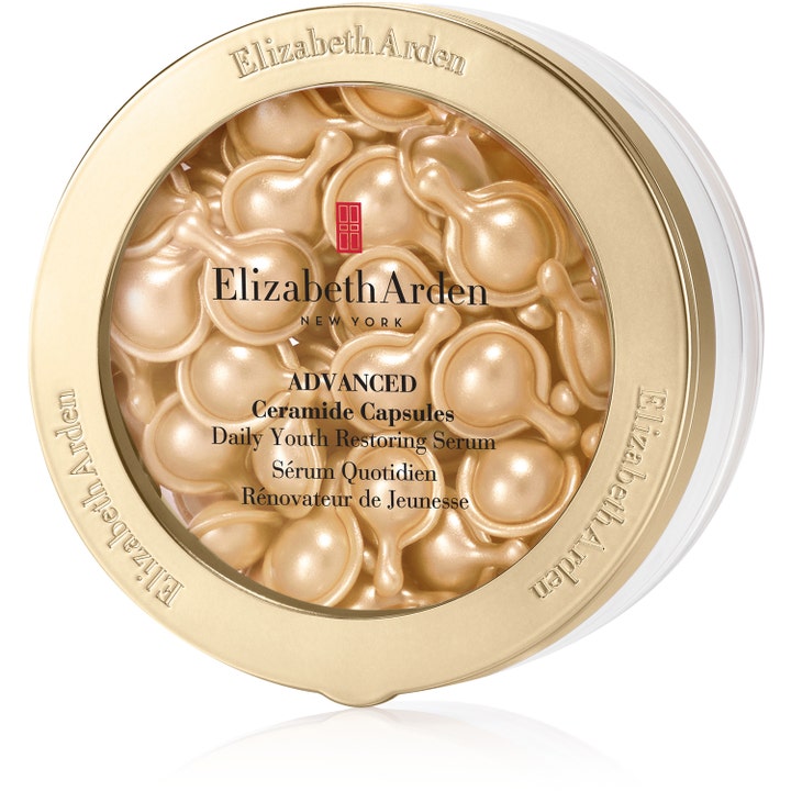 Elizabeth Arden Advanced Ceramide Capsules Youth Restoring Serum i gullfargede kapsler i en rund beholder.
