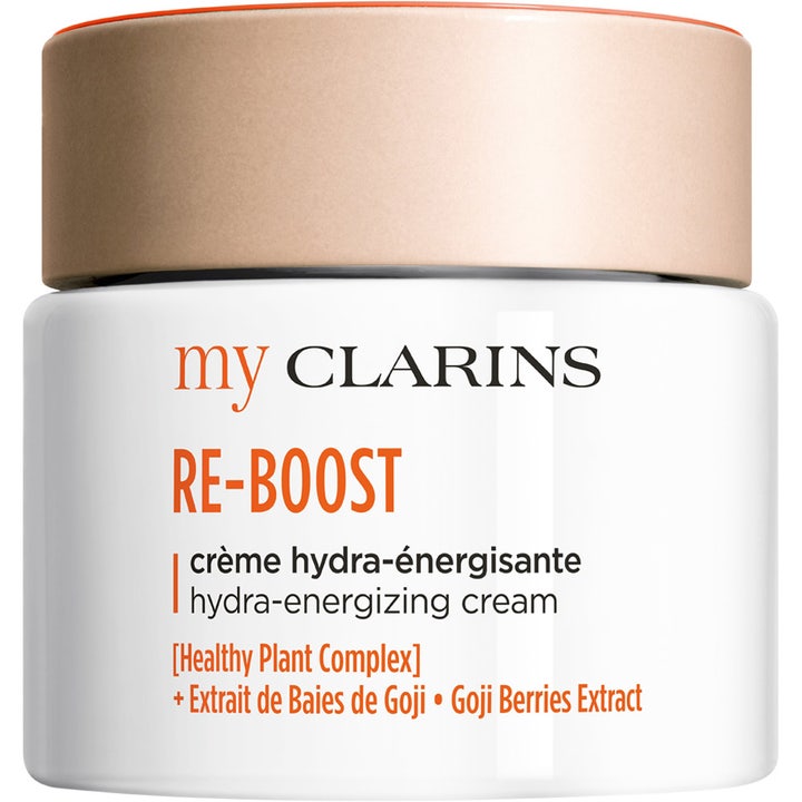 My Clarins RE-BOOST fuktighetsgivende ansiktskrem med gojibær som gir energi i hvit krukke med rosegullfarget lokk