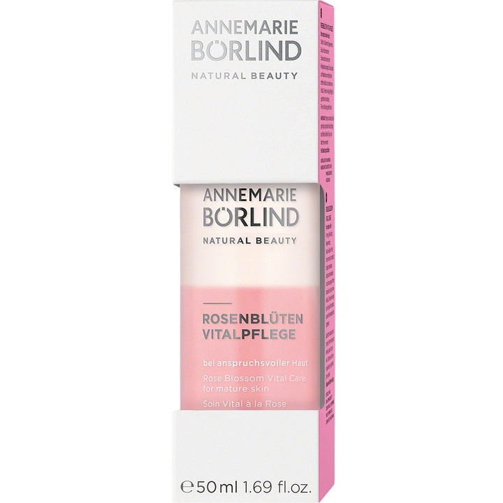 Annemarie Börlind Rose Blossom Vital Care 50 ml ansiktspleie for moden hud viser en rosa tofase-væske i hvit eske.