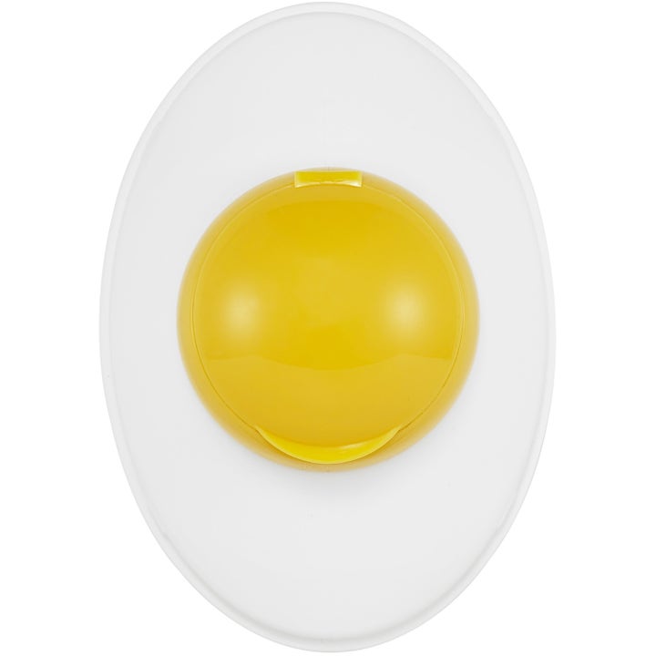 Holika Holika Smooth Egg Skin Peeling Gel 140 ml ansiktsskrubb i unik hvit og gul eggformet plastemballasje.