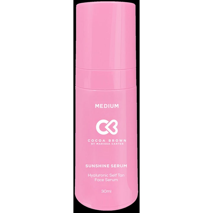 Cocoa Brown Sunshine Serum 30ml selvbruning med hyaluronsyre gir fukt og glød i en rosa sylindrisk flaske.