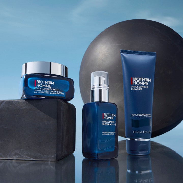 Biotherm Homme Force Supreme Blue Serum 30 ml anti-aging hudpleie i blå glassflaske med krem og rens på stein