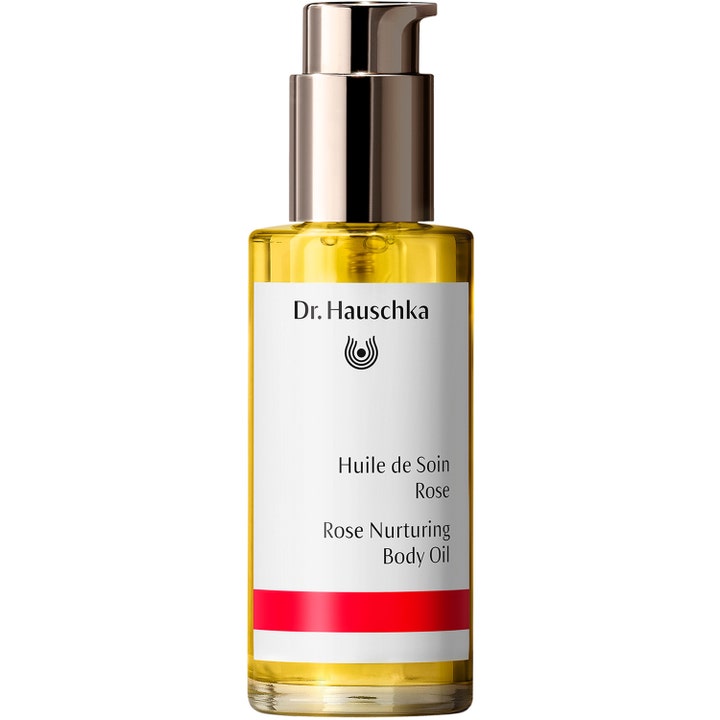Dr. Hauschka Rose Nurturing Body Oil 75 ml pleiende kroppsolje i klar glassflaske med gyllen olje og metallpumpe