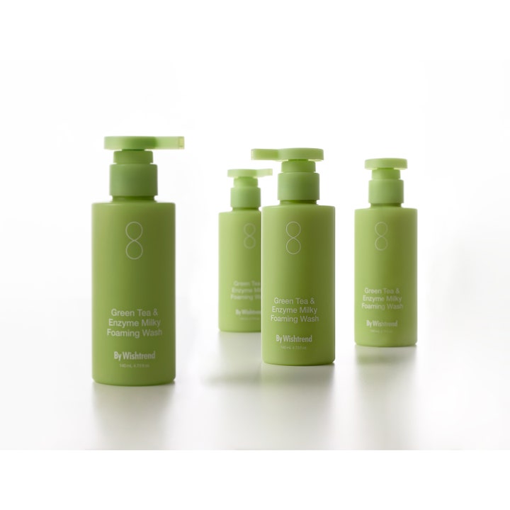 By Wishtrend Green Tea & Enzyme Milky Foaming Wash 140 ml ansiktsrens i fire lysegrønne pumpeflasker.