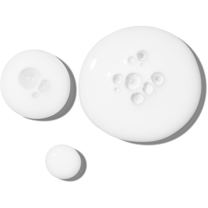 The Ordinary Rice Lipids + Ectoin Microemulsion 60 ml ansiktskrem med en hvit melkeaktig tekstur og små luftbobler