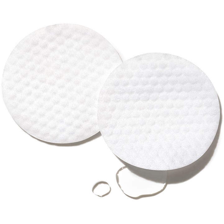 Exuviance Performance Peel AP 25 26 pads peeling som gir glød med hvite teksturerte pads og klare væskedråper