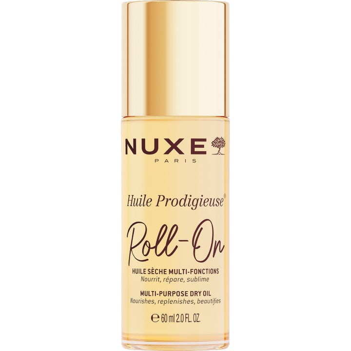 Nuxe Huile Prodigieuse Roll-On 60 ml nærende tørrolje i en klar sylindrisk flaske med elegant gullfarget kork.