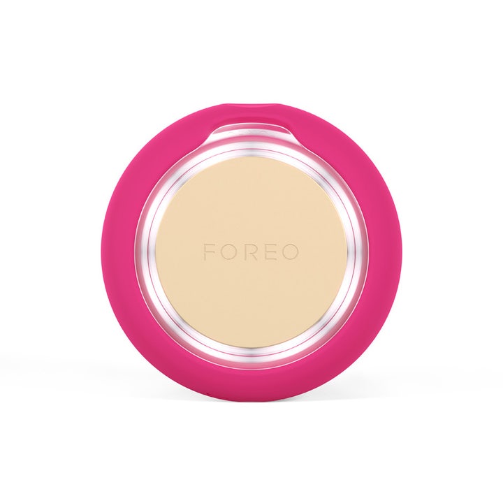 FOREO UFO™ 3 mini Fuchsia 1 stk ansiktsbehandling i fuchsia silikon med gullfarget varmeplate.