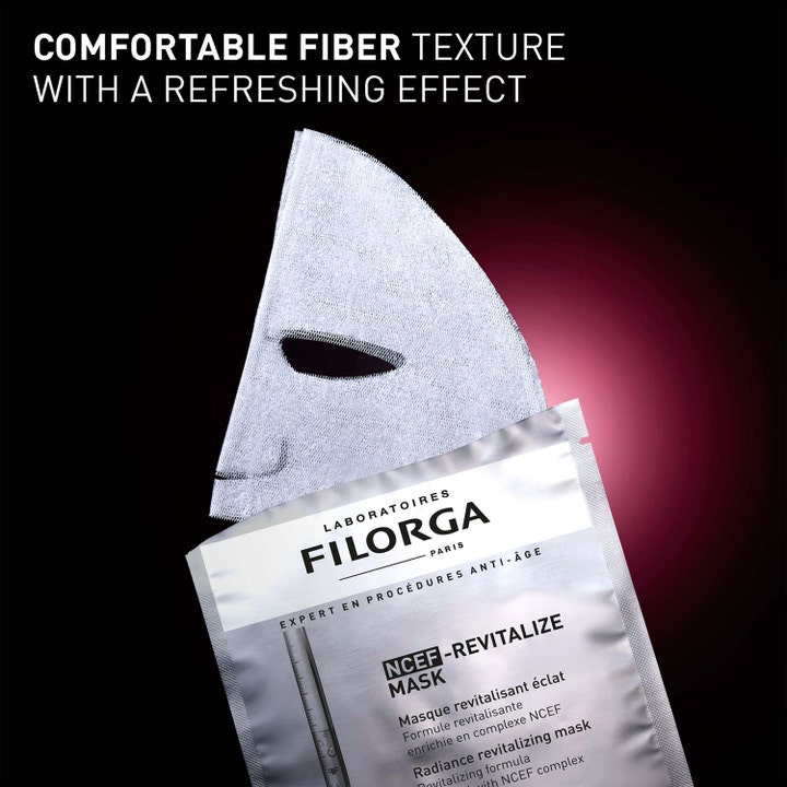 Filorga NCEF-Revitalize Revitalizing Radiance Mask 20 ml sheet maske gir glød med hvit fibertekstur i en sølvfarget pose