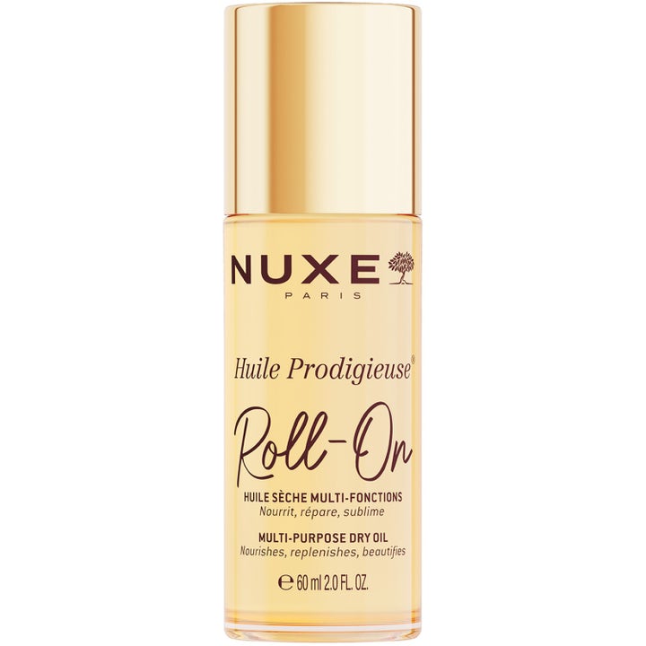 Nuxe Huile Prodigieuse Roll-On 60 ml nærende tørrolje i en klar sylindrisk flaske med elegant gullfarget kork.