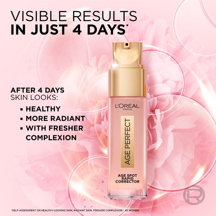 L'Oréal Paris Age Perfect 30 ml serum mot pigmentflekker i gullfarget pumpeflaske mot rosa blomsterbakgrunn