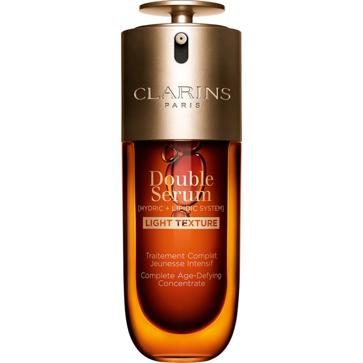 Clarins Double Serum Light Texture 50 ml aldersforebyggende serum som gir glød i ravfarget glassflaske med gullpumpe