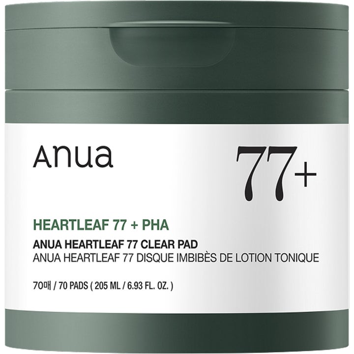 Anua Heartleaf 77 Clear Pad 70 stk eksfolierende tonerpads i mørkegrønn krukke med hvit etikett og stor 77-tekst