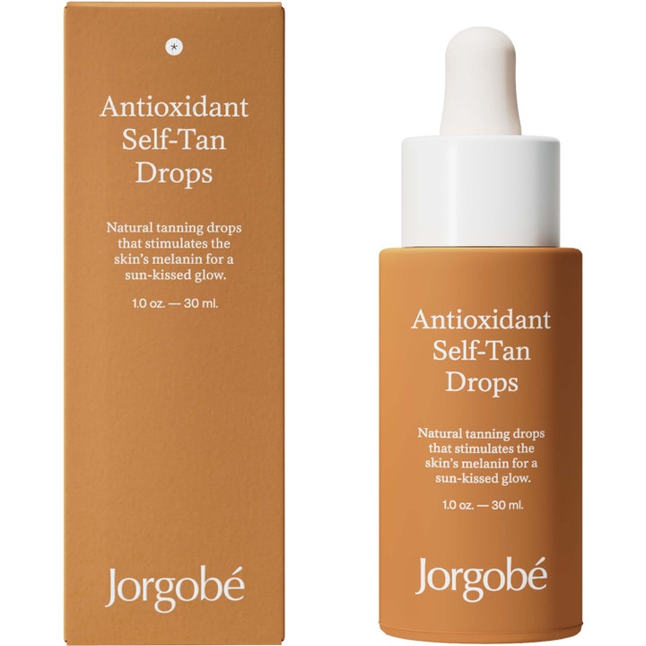 Jorgobé Antioxidant Self-Tan Drops 30 ml selvbruningsdråper gir solkysset glød i brun flaske med hvit pipett og eske.