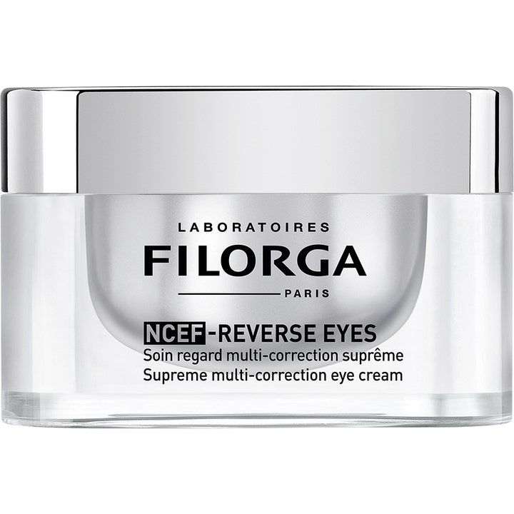 Filorga NCEF-Reverse Eyes 15 ml multi-korrigerende øyekrem i en elegant glasskrukke med sølvfarget innerbeholder og lokk