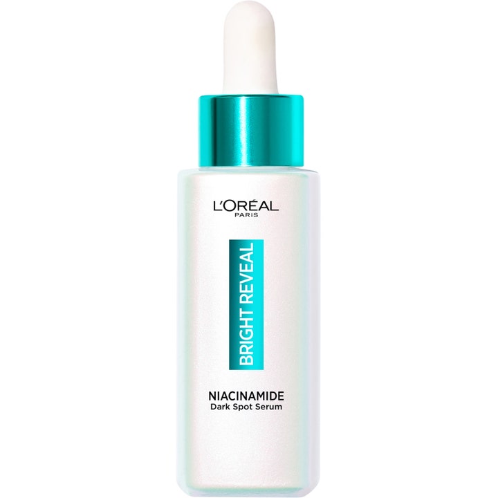 L'Oréal Paris Bright Reveal Niacinamide Dark Spot Serum mot pigmentflekker i en perlemorshvit flaske med turkis kork