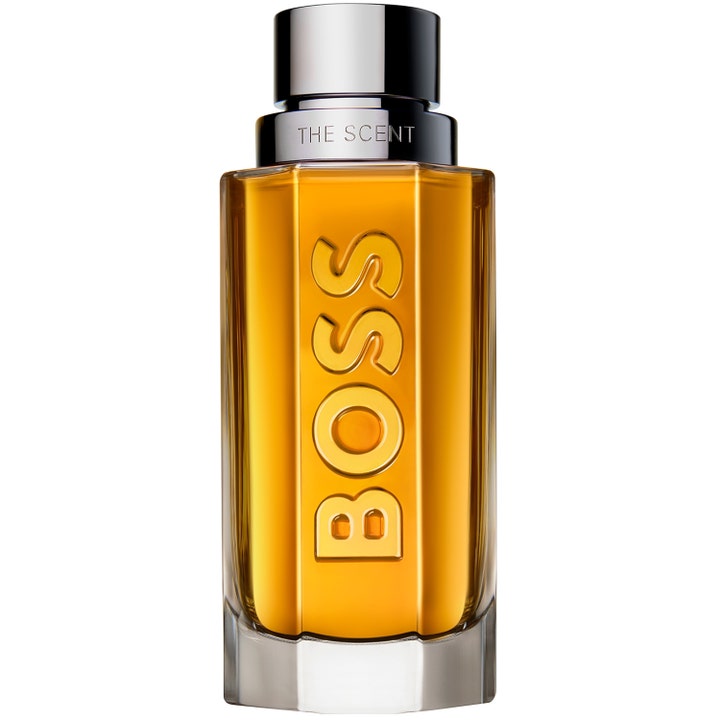 Hugo Boss The Scent 100 ml parfyme gir en maskulin duft i fasettert glassflaske med ravfarget væske og sølvkork