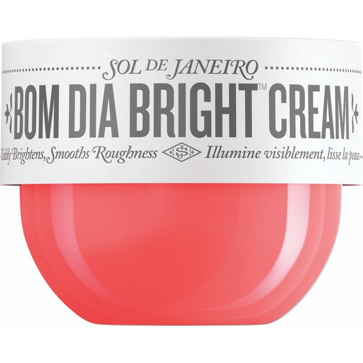 Sol de Janeiro Bom Dia Bright Cream 75 ml eksfolierende kroppskrem i korallrød krukke med hvitt lokk