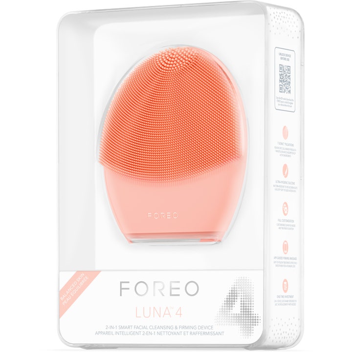 FOREO LUNA 4 Balanced Skin 1 stk ansiktsrens og oppstramming i oransje silikon vist i hvit og klar ytteremballasje