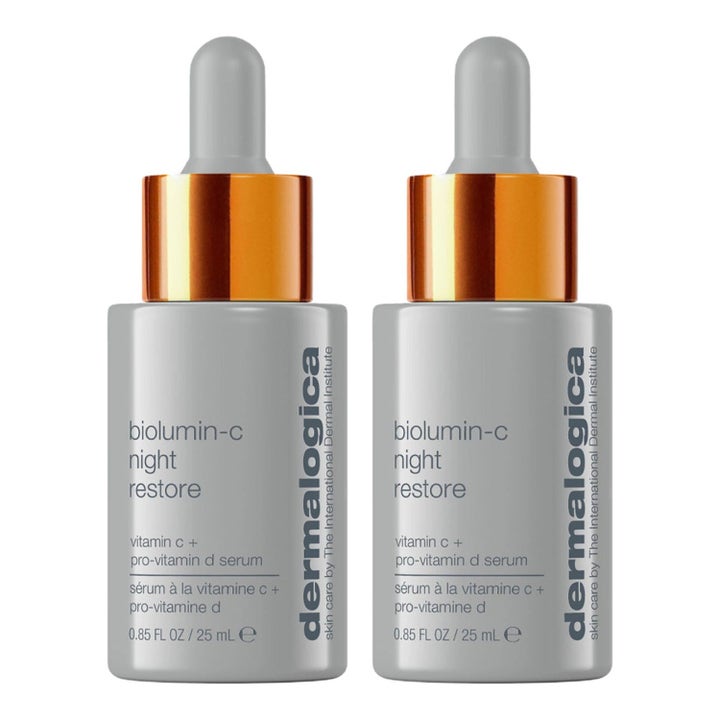 Dermalogica Biolumin-C Night Restore 25 ml nattserum med vitamin C som gir glød i to grå flasker med gullfarget kork.