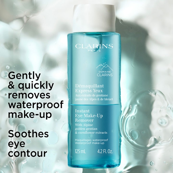 Clarins Instant Eye Make-Up Remover 125 ml fjerner vannfast sminke vist som en blå tofase-flaske i vann med bobler.