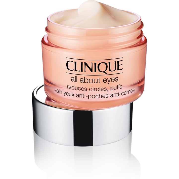 Clinique All About Eyes øyekrem reduserer poser og mørke ringer i ferskenfarget krukke med lys tekstur.