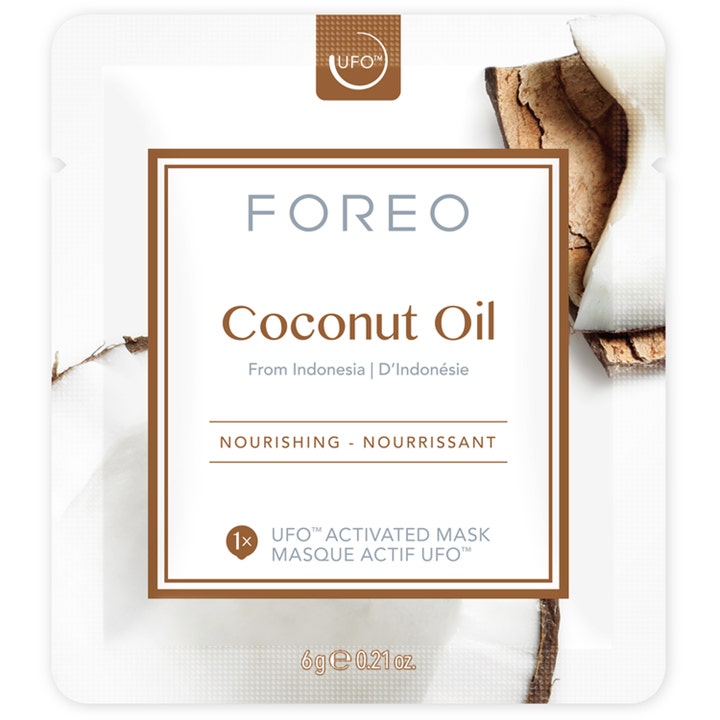 FOREO UFO Mask Coconut Oil 6 g nærende ansiktsmaske i hvit sachet dekorert med biter av kokosnøtt.