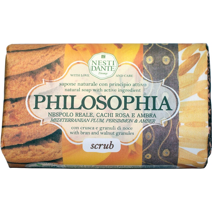 Nesti Dante Philosophia Scrub 250g eksfolierende såpe i dekorativt papir med illustrasjoner av plomme og rav.