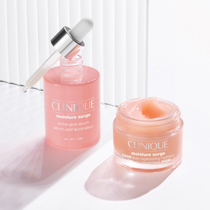 Clinique Moisture Surge Active Glow Serum 50 ml og ansiktskrem i rosa glasskrukke med pipette