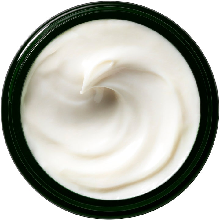 Origins Dr. Weil Mega-Mushroom Face Cream 50 ml beroligende ansiktskrem med hvit kremet tekstur i en mørkegrønn krukke