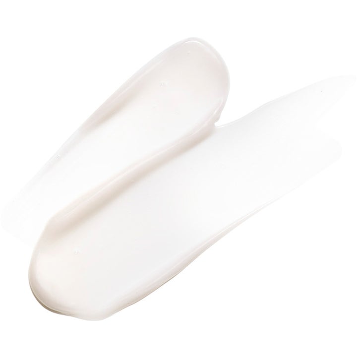 Exuviance Night Corrector 50 g nattkrem med en fyldig og glatt hvit kremkonsistens vist i et strøk.