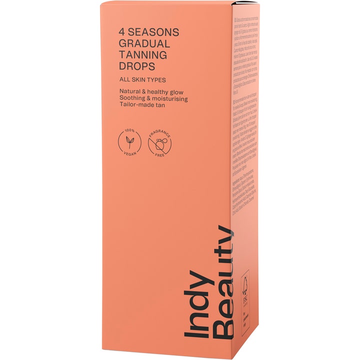 Indy Beauty Gradual Tan Drops 30 ml selvbruning for ansikt i ferskenfarget eske som gir naturlig glød.