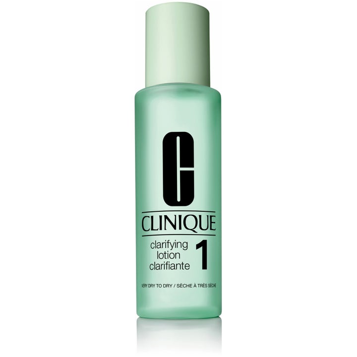 Clinique Clarifying Lotion 1 eksfolierende ansiktsvann for tørr hud i mintgrønn frostet flaske med grønn kork.