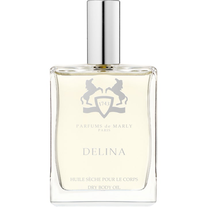 Parfums de Marly Delina tørr kroppsolje i gjennomsiktig glassflaske med sølvkork som gir huden fuktighet og pleie.