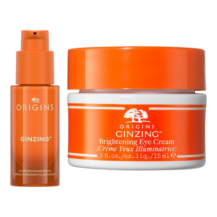 Origins GinZing Glow-Boosting Serum og Eye Cream 15 ml gir glød i oransje pumpeflaske og hvit krukke med oransje lokk.