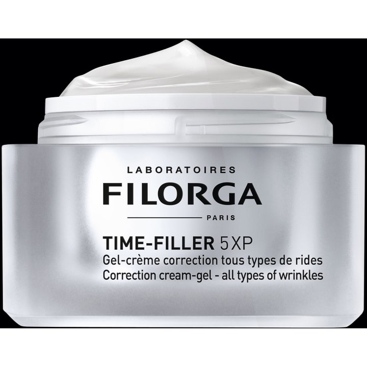 Filorga Time-Filler 5 XP 50 ml korrigerende ansiktskrem mot rynker i åpen sølvfarget krukke med hvit gelkrem