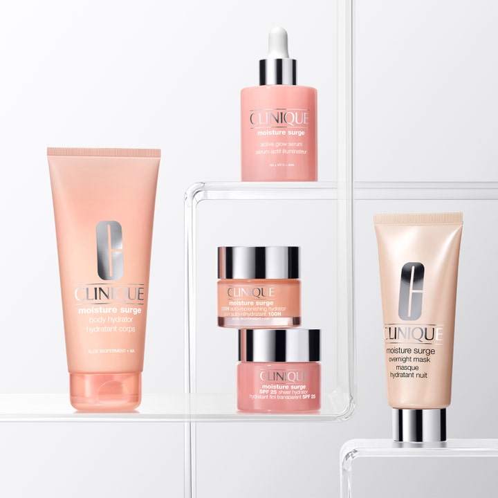 Clinique Moisture Surge Body Hydrator 200 ml fuktighetsgivende kroppskrem i ferskenfarget tube på klar hylle.
