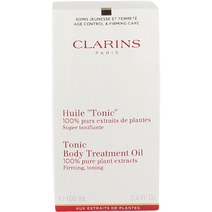 Clarins Tonic Body Treatment Oil 100 ml oppstrammende kroppsolje i hvit ytteremballasje med rød tekst