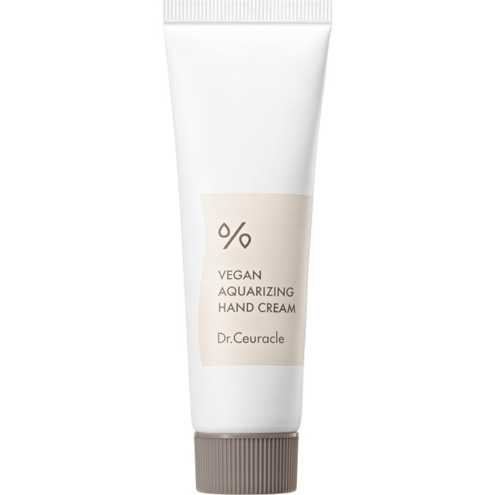 Dr. Ceuracle Vegan Aquarizing Hand Cream fuktighetsgivende vegansk håndkrem i hvit tube med beige etikett og rillet lokk.