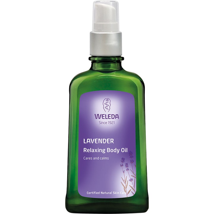 Weleda Lavender Relaxing Body Oil 100 ml beroligende kroppsolje i grønn glassflaske med lilla etikett og sølvpumpe